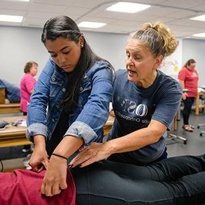 Centre student interning with a physical therapist
